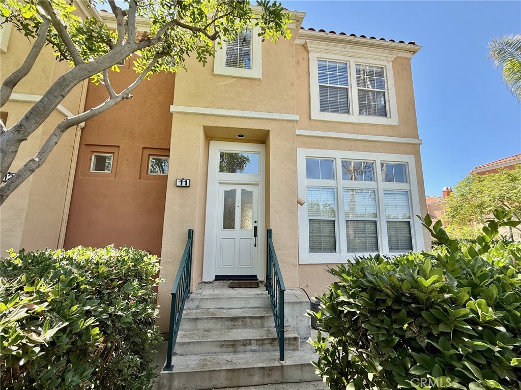 Experience Exceptional Privacy and Light in the Heart of Irvine’s Most Sought-After Community! If you're searching for a truly unique private home in a gated community located in one of Irvine’s most desirable neighborhoods, look no further; this is the one. Tucked away in a prime end-unit location within the exclusive Corte Bella community, this home offers unmatched privacy and abundant natural light. Unlike many neighboring homes even in the same community, this residence features several oversized side windows, a rare benefit that fills the interior with sunlight throughout the day, reducing the need for artificial lighting. What sets this home apart even further is the lack of any homes directly in front, ensuring no intrusive views into your living room or bedrooms, a luxury not commonly found in Corte Bella. Another highlight is the exceptionally deep two-car garage, unique to this unit. It easily fits two full-size vehicles and still offers ample storage space at the back and sides; perfect for active lifestyles or growing families. Inside, the home has been thoughtfully upgraded with elegant tile flooring on the main level and warm, stylish wood flooring upstairs. Step outside to enjoy a beautifully private patio space, framed by lush greenery; ideal for barbecues, entertaining guests, or simply relaxing in a serene setting. Convenience is key: extra guest parking and a charming white statue at the entry create a welcoming experience for family and friends. Just a short walk away are the community’s private amenities, including a pool, spa, and BBQ area. Plus, you're only steps from Sprouts, major supermarkets, department stores, and a variety of restaurants; everything you need right at your doorstep. Don’t miss the opportunity to rent one of the most private and light-filled homes in Corte Bella. Schedule your private showing today.