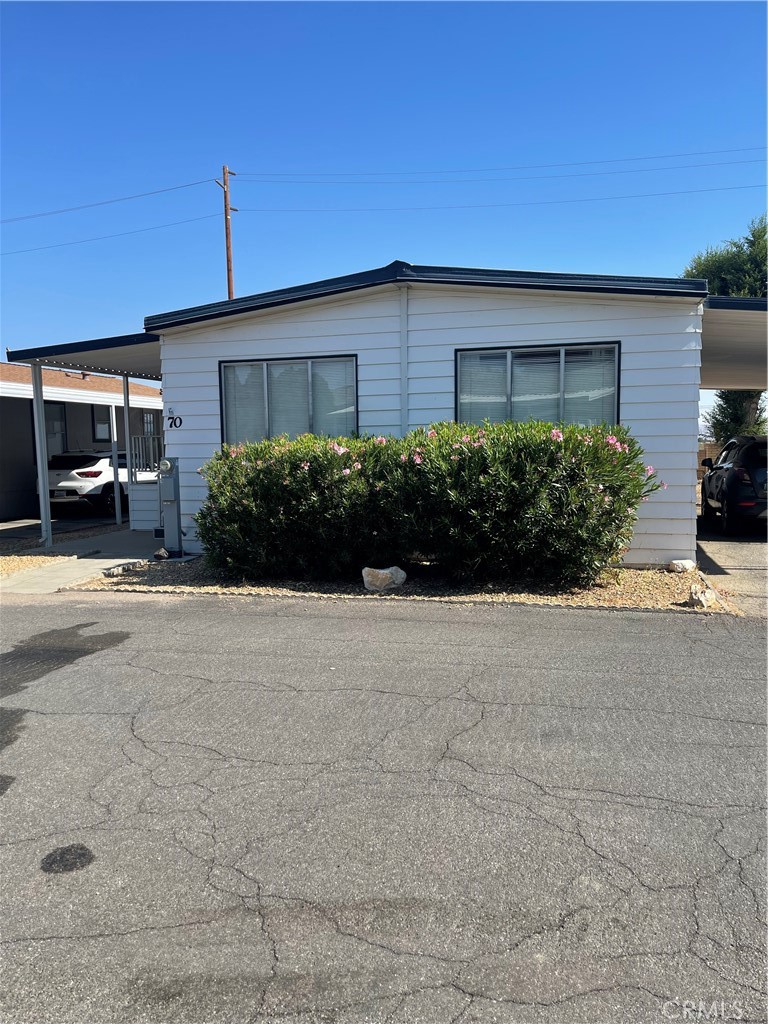Nice Park in Apple Valley. Home features 2 large Bedrooms 2 bath. Formal living room and also Formal dinning room with built in hutch. Nice Family room off the kitchen with an enclosed patio. Home has an indoor laundry room with storage. Nice front porch and a large shed.