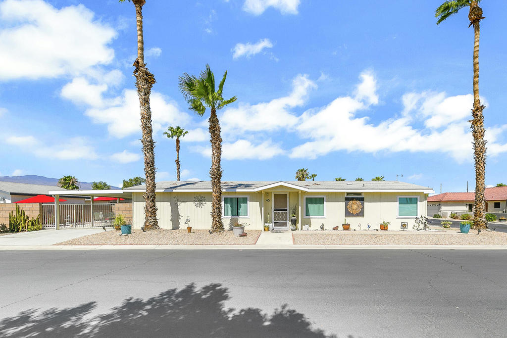 Available October 2025 - May 2026 Furnished Seasonal LeaseWelcome to Desert Groves, a gated 55+ community offering resort-style amenities and a relaxed lifestyle. This well-maintained 2-bedroom, 2-bath double-wide home features an open-concept great room with vaulted ceilings, a cozy den with fireplace, and a split floor plan for added privacy. The spacious primary suite includes a jetted tub and separate stall shower. Enjoy a private, gated carport, a one-car garage, and additional community parking for guests. Lease is fully furnished per seller's inventory. Community amenities include two pools, a clubhouse, and RV parking--perfect for your desert getaway!