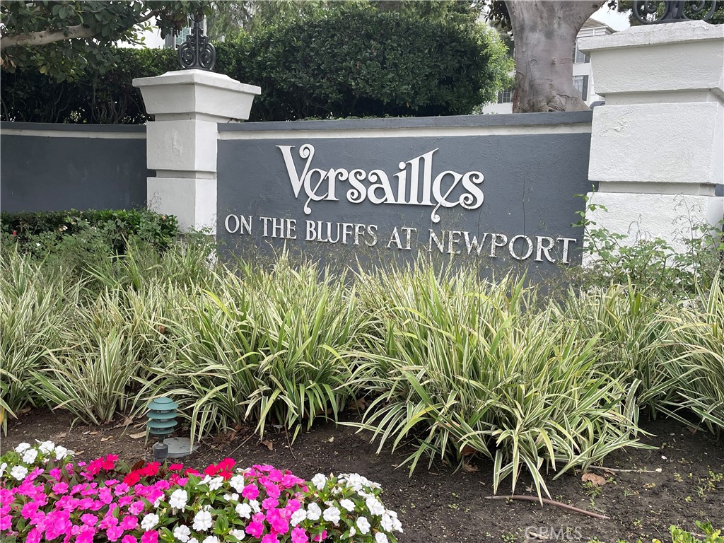Absolutely gorgeous Versailles 1 bedroom and 1 bath condominium with numerous recent upgrades including custom wood laminate and tile flooring, custom wood cabinetries, custom molding, stone Kitchen Countertops, Newer Kitchen Sink & Appliances, Tiled Shower & Bathroom & Kitchen Floors, Custom Plumbing Hardware and Bathroom Sink, Custom Lighting Fixtures   Excellent ground floor location with a view of the lush garden and sparkling fountain area. Very quiet, serene and secure location within the exclusive and secure Versailles Association. Ground floor 1 bedroom and 1 bath unit. Absolutely gorgeous interior decor. Custom paint. Nice and clean and ready to move in. Spacious one bedroom model with private patio. Best area value! Quiet and sunny north facing exposure. Great association with pool, spa, clubhouse and gym. Just a short stroll to oceanfront. Resort-like Community with Pool, Spa, Clubhouse, Sauna, Weightroom, Library, etc. etc. Short Stroll to Oceanfront.