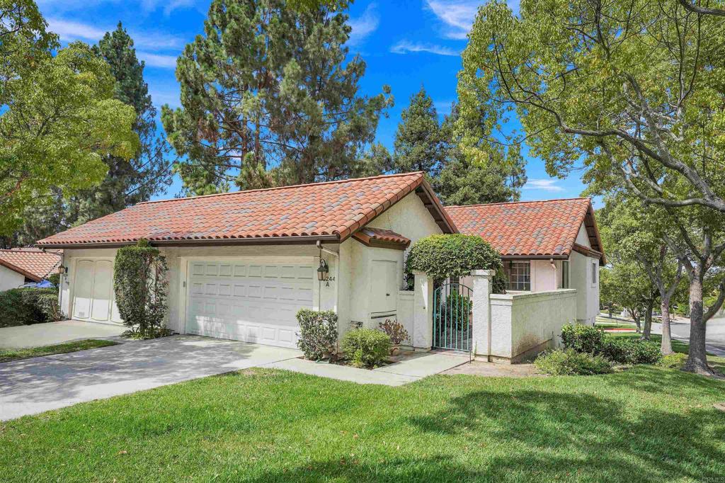 Modern and spacious twinhome in the desirable Bernardo Heights community with resort-style amenities and updated interiors. Enter through the gated front courtyard into the main level featuring vaulted ceilings, open living & dining area with fireplace, and French doors leading to the balcony. The kitchen boasts quartz countertops, white shaker cabinetry, stainless appliances, breakfast bar, and an eat-in dining nook. All three bedrooms are located downstairs, including a spacious primary with two walk-in closets and an ensuite bath with dual sinks and subway tile shower. Other highlights include freshly painted interiors, new blinds, central A/C, dedicated laundry room, attached two-car garage, and below-ground storage with potential to convert to additional square footage. Multiple outdoor spaces, including an expansive fenced front courtyard and a covered back patio connected to a sizeable grassy area, providing the feeling of a full backyard. Community amenities include a pool & spa as well as access to both the Bernardo Heights Clubhouse and Lucido Park featuring additional pools & spa, wading pool, fitness center, tennis & pickleball courts, sports fields, playgrounds, and more. HOA dues cover water, cable, internet, sewer, trash, and common area maintenance. Located within the top-rated Poway Unified School District, and close to shopping, dining, golf, and freeway access. Lake Hodges, Black Mountain, and hiking trails nearby, and only 20 minutes to the beach.