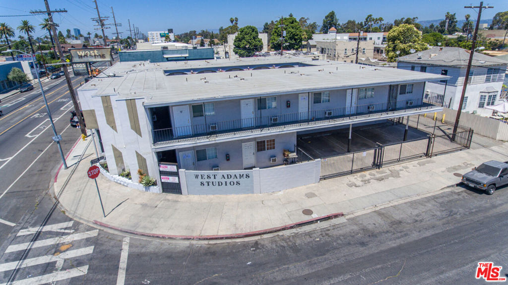 We are pleased to present 4905 West Adams Boulevard, a thirty-six-unit multifamily investment opportunity located in the heart of the rapidly evolving West Adams neighborhood of Los Angeles. This stabilized asset offers an investor immediate cash flow in a high rental demand submarket, with an attractive unit mix of micro-units that cater to tenants seeking affordable and efficient housing. With strong in-place income, a historically low vacancy rate, and excellent long-term fundamentals, the property presents a compelling opportunity for both yield-focused and growth-oriented investors. Originally constructed in 1964, the property consists of thirty-four bachelor units, one two-bedroom/one-bathroom unit, and one one-bedroom/one-bathroom unit. The property is master-metered for all utilities and features a central water heating system. Residents benefit from secure, gated access and twenty-three covered parking spaces. In addition to its core income-generating features, 4905 West Adams offers significant development potential. Current ownership has completed preliminary schematic plans to add twenty ADUs under the existing ADU ordinances comprising six studios, twelve one-bedroom units, and two two-bedroom units providing a clear path to dramatically increase the unit count and income. The property is also in compliance with Los Angeles' seismic retrofit requirements; the soft-story permit has been issued, and the retrofit must be completed by April 30, 2028. Furthermore, a permit has been approved to install built-in cooktops in all units, offering an immediate opportunity to enhance desirability and rental value. Situated just two blocks from the nearest on- and off-ramps to the I-10 Freeway, the property provides excellent regional access to Downtown Los Angeles, Culver City, USC, and the Westside. West Adams has become one of LA's most dynamic and gentrifying submarkets, with new multifamily and retail developments continuing to reshape the urban landscape. With high rental demand and a shortage of affordable housing options, 4905 West Adams is ideally positioned to deliver both near-term and long-term returns. The property is subject to the Los Angeles Rent Stabilization Ordinance (RSO).
