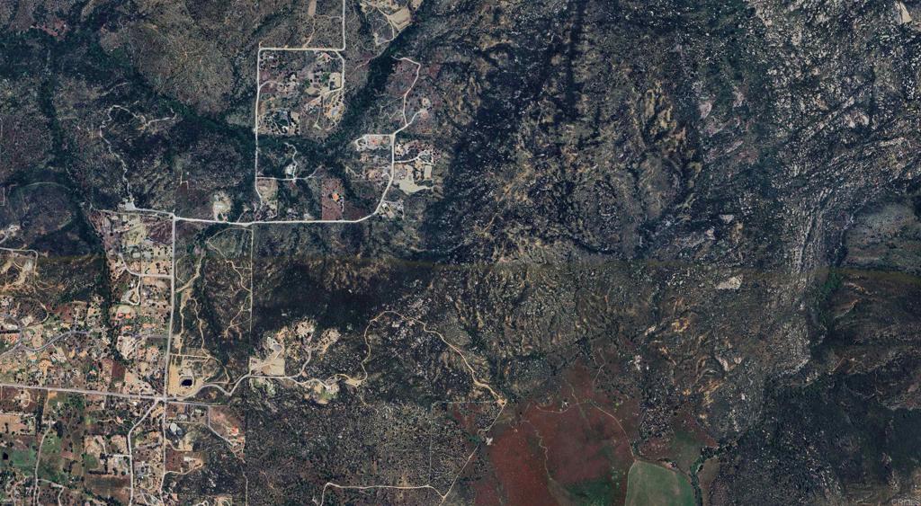 The subject property is located on Paradise Mountain Road on the border of Escondido and Valley Center within San Diego County jurisdiction. The property consists of two parcels totaling approximately 50.95 acres. The property is vacant land zoned Agriculture (A70) with a general plan designation of Rural Lands (RL-40). The property may be used for agriculture, open space, or potential mitigation land.