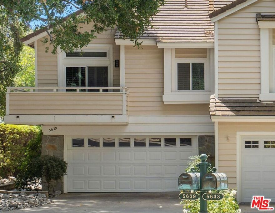 Tucked inside the private gates of Meadow Oaks, one of the most sought-after townhouse communities in the area, this 3-bedroom, 3-bathroom home offers over 2,145 sq. ft. of well-designed living space. Located at the end of a cul-de-sac with no neighbors across the street, it feels more like a quiet retreat in the country yet near shops, restaurants and schools. A stately oak tree welcomes you at the entry, leading into a dramatic living room with soaring ceilings great for entertaining friends or simply relaxing in style. Plantation shutters throughout add both privacy and a touch of classic design. The kitchen is a dream for anyone who loves to cook: a central island breakfast bar, Viking six-burner range top, Sub-Zero fridge/freezer, Bosch dishwasher, and KitchenAid Superba oven and microwave. Soft-close cabinetry with smart pull-outs keeps everything organized and within reach. Just off the chef's kitchen, a flexible den makes the perfect spot for family movie nights, a home office, or a sunny corner for morning breakfast. Upstairs, the spacious primary suite features its own balcony for morning coffee. The bath feels spa-like, with double sinks and a soaking tub. Two additional bedrooms with hardwood floors give flexibility for family, guests, or office space. Outdoor living shines here too. A fenced-in patio sets the stage for dining al fresco or relaxing under the stars. And just steps away literally next door you'll find the gated community pool and spa. For anyone who values health and wellness, having these amenities right outside your door makes it easy to keep a balanced lifestyle. If you've been waiting for the right blend of comfort, privacy and convenience, this is the one. Come check it out!     Some photos are virtually staged.