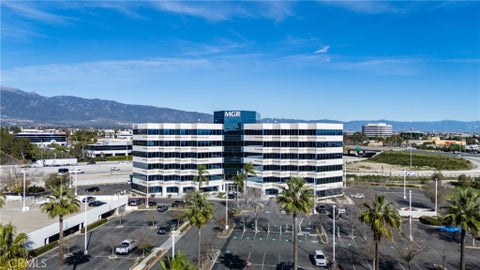 Photo of 3401 Centre Lake Drive #550, Ontario, CA 91761 (MLS # CV26121265)