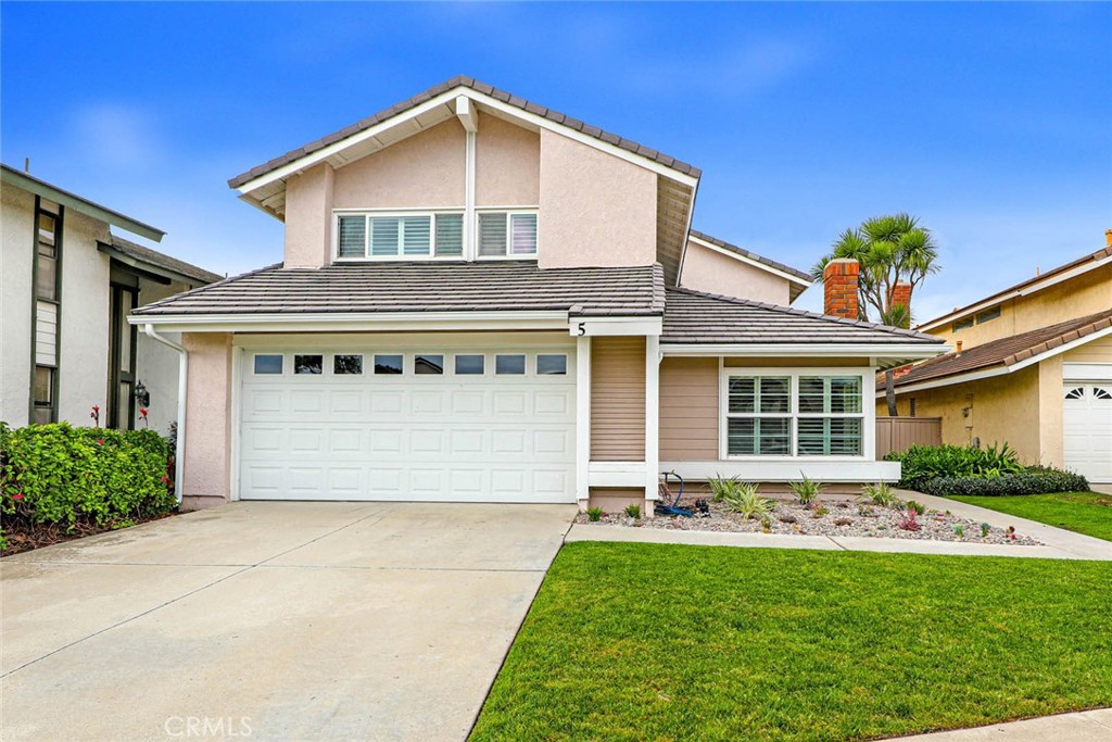 First time on the market! This beautifully maintained 4-bedroom, 2.5-bathroom home is located in Irvine’s highly desirable Woodbridge community and has been lovingly cared for by the original owner—showcasing true pride of ownership and quality upgrades throughout. Step into the inviting living room, where vaulted ceilings, newer dual-paned windows, and a cozy fireplace create a bright, open, and welcoming space. The upgraded kitchen is a true highlight, featuring granite countertops, stainless steel appliances, and ample cabinet space, perfect for everyday cooking or entertaining. The kitchen flows seamlessly into the dining and family rooms, offering a functional and open layout that makes this home ideal for gatherings of any size. Upstairs, you’ll find four spacious bedrooms with excellent natural light, offering plenty of flexibility for families, guests, or home office needs. The home includes plantation shutters, a convenient inside laundry room, and a finished garage with epoxy flooring and an electric vehicle adapter. HVAC system only 2 years old. Step outside to a generously sized backyard, offering ample space for outdoor activities and relaxation. Walking distance to award winning schools, close freeway access and centrally located near multiple restaurants and entertainment. This residence combines functionality with elegance, making it an ideal choice for those seeking a harmonious living experience in a prime Irvine location.
This is a rare opportunity to own a truly special home in one of Irvine’s most coveted neighborhoods.