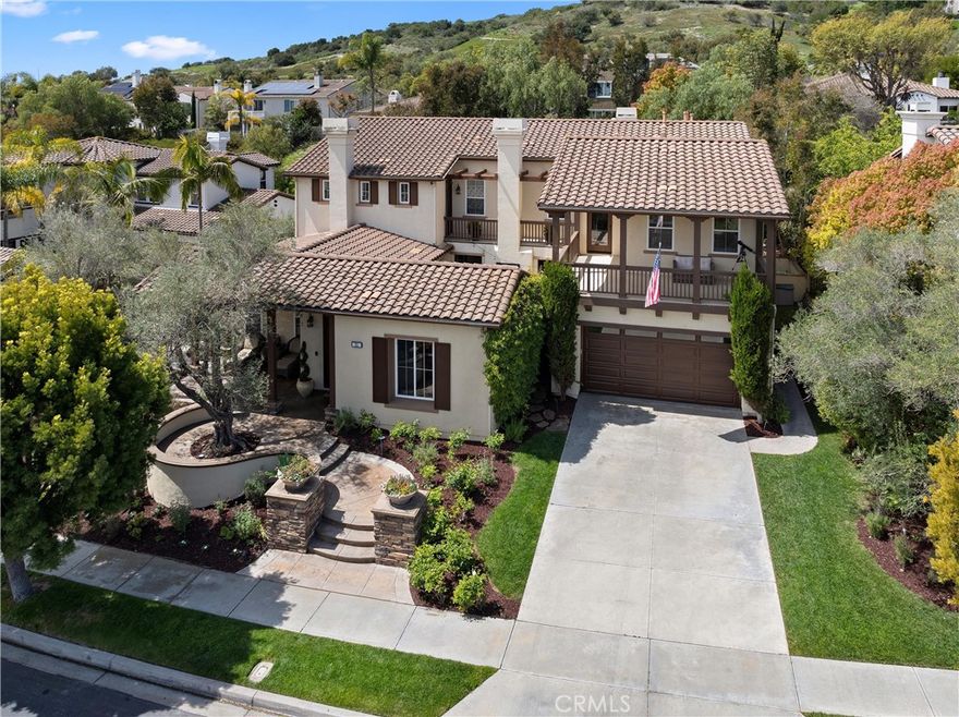 Set within Montellano’s rare four-home enclave, this residence uniquely owns its entire lot—including the slope—enabling a thoughtfully engineered hillside cut that expands the usable backyard into a private, maturely landscaped retreat. The light-filled, open layout offers 5 bedrooms and 5.5 bathrooms, designed for effortless indoor/outdoor living and entertaining. Custom upgrades and timeless finishes carry throughout.



Outdoor spaces include a secluded front courtyard with fireplace and multiple zones to dine, lounge, and gather across the expansive rear yard. Located in the heart of Talega, residents enjoy access to resort-style pools, pickleball, tennis and basketball courts, a baseball field, parks, a striking clubhouse, and scenic trails through the adjacent conservancy, plus community events and a seasonal beach trolley. Minutes to shopping, dining, entertainment, world-class beaches, and top-rated schools.