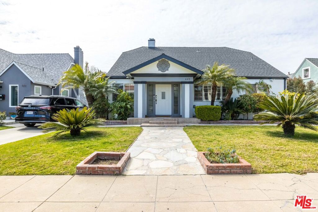 Lovely, fully-remodeled home located in prestigious Hancock Park-Wilshire. This home spans across 2,288 sq ft (1768 sq ft 4 bed 3 bath main house + 520 sq ft 1 bed studio 1 bath ADU) and is situated on an expansive 7,752 sq ft open lot with a gated driveway. Enter and you are immediately welcomed into a gracious living environment flooded with natural light. Cozy up next to the striking fireplace or gather in the spacious living and dining space that flows seamlessly into the bright, modern kitchen. A mosaic tile backsplash, stone countertops, stainless steel appliances and an expansive walk-in pantry complete the heart of this home. Enjoy generously-sized bedrooms with ample storage space and the added flexibility to convert the upstairs bedroom into an office. Retreat to the primary suite that boasts two walk-in closets, an ensuite bath with dual vanity and convenient, direct access to the backyard. Relax and lounge on the custom-built, sun-washed deck that provides a perfect setting for entertaining and dining al fresco. The garage has been converted into a spacious 520 sq ft studio ADU with a full bathroom, offering endless configurations to suit any lifestyle. Just a couple blocks from Trader Joe's, Ralphs, and LA's trendiest and finest restaurants, shopping, and entertainment. Truly a stellar location. Experience elevated living in the city today!
