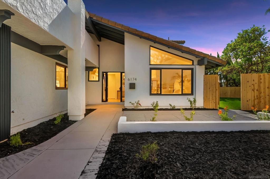 Experience modern coastal living in this fully remodeled five-bedroom, three-and-a-half-bath home in highly desirable University City. Set on a 9,100 sq. ft. lot, this residence features vaulted ceilings, abundant natural light, and a gourmet kitchen with waterfall-edge quartz counters, custom oak cabinetry, and a large island. Enjoy seamless indoor-outdoor living with 12-foot cantina doors opening to a landscaped backyard with west-facing canyon views, a refinished pool, and multiple decks—including a private deck off the primary suite. Flexible layout offers dual primary suites, designer bathrooms, and wide-plank luxury vinyl flooring throughout. Additional highlights include a three-car garage and a quiet cul-de-sac location near top schools, beaches, parks, shopping, and dining.