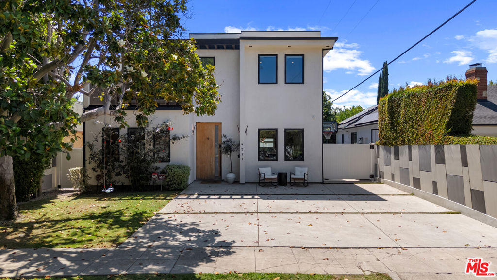 For Lease | Stunning Contemporary in Studio City. Welcome to 4299 Elmer Ave, Built in 2020, a 5-bedroom, 5-bathroom contemporary home located in the heart of Studio City's desirable Tujunga Village neighborhood. This two-story residence offers over 3,682 sq ft of thoughtfully designed living space with modern finishes throughout. The main level features engineered hardwood floors, an open-concept living and dining area, and a gourmet kitchen with custom cabinetry, high-end appliances, a large center island, and a built-in dry bar. A spacious primary suite is conveniently located on the first floor, complete with a walk-in closet and ensuite bathroom. Upstairs, you'll find an additional primary suite with a double vanity, designer tile, and walk-in shower, along with generously sized secondary bedrooms and bathrooms. The private backyard is ideal for entertaining, featuring a heated pool and spa, surrounded by lush landscaping. The detached garage has been converted into a versatile finished spaceperfect for a home office, studio, or guest room. Additional features include central HVAC, recessed lighting, upstairs laundry, and a gated front entry. Located just moments from shopping, dining, and parks, this move-in-ready home offers comfort, luxury, and convenience in one of Studio City's most charming neighborhoods. --- The garage was converted to livable space and is included in the total square footage.