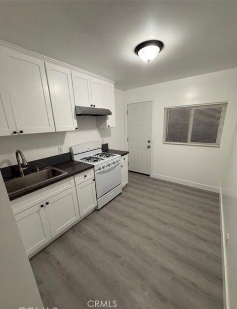 Photo of 7134 Granger Avenue #7, Bell Gardens, CA 90201 (MLS # PW26166110)