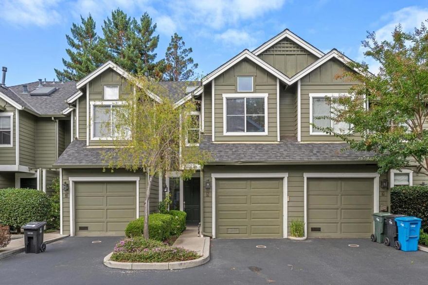 Move-in ready. This stylish 2-story home offers a bright open floor plan with elegant living and dining areas featuring bamboo floors, high ceilings, crown moldings, recessed lighting, and a cozy fireplace. The updated kitchen shines with granite counters, stainless steel appliances, a breakfast bar, and abundant cabinetry. Private patio with mature maples is perfect for relaxing or entertaining. Two spacious en-suite bedrooms upstairs with vaulted ceilings and skylights, including a primary suite with a walk-in closet and dual-sink vanity. Laundry room, dual-pane windows, 1-car attached garage + assigned parking. Beautifully maintained Pacific Parc grounds close to downtown Menlo Park, Palo Alto, Caltrain, Meta, parks, and Willow Oaks Park access.