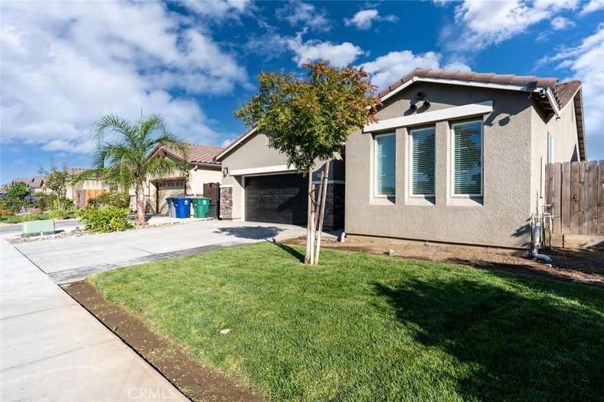 Welcome to this stunning 4-bedroom, 3-bathroom home offering 1,724 sq. ft. of modern living space, built in 2020. Designed with comfort and efficiency in mind, this open floor plan features spacious living areas perfect for entertaining and everyday living. Enjoy paid solar, keeping energy costs low year-round, and plumbing ready for a water softener and reverse osmosis system for added convenience. The home also features beautiful stamped concrete, enhancing curb appeal and creating the perfect outdoor space for gatherings or relaxation. This move-in-ready home combines style, functionality, and sustainability all in a desirable neighborhood close to schools, parks, and shopping. Don't miss the opportunity to make this exceptional property your new home!