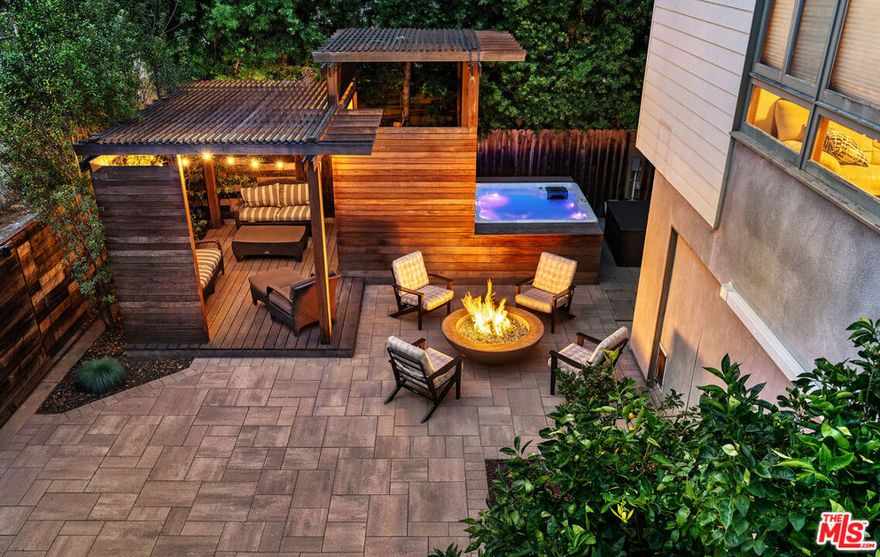 Beautiful, vibrant, and spacious home on a tucked-away, quiet one-way street in the heart of downtown Culver City. This home incorporates the original charm of the 1938 California Bungalow AND is expanded and enhanced with tasteful modern architectural details.  Fan Favorite #1: Location. A hidden away, two-block stretch of Farragut Dr., just two blocks to downtown Culver City shops, restaurants, and multiple-plex movie theater. Also walkable to the nature center at the top of the Culver Steps and surrounding hiking trails.  Fan Favorite #2: Bright and open chef inspired modern Kitchen + Dining Room with high ceilings, ample counter space and cabinetry - ideal for family gatherings and entertaining. Fan Favorite #3: 2 Bedrooms and 2 full Baths downstairs, PLUS Step-down Den and a Bonus room that offers a perfect flex space for a home office or playroom. Two huge Ensuite Bedrooms Upstairs + Lofted office with tree top views above primary bedroom. Fan Favorite #4: French doors that lead to your private backyard oasis. Enjoy fruit trees, custom fencing, a gazebo lounge, luxurious spa, cozy fire pit, and multiple seating areas, making this home/yard an entertainer's dream for year-round indoor/outdoor living.  WHY this home: Perfect for living, working, hosting, and relaxing. You will enjoy the best of timeless charm and modern luxury: Graceful archways, coved ceilings, original hardwood floors that flow into an open-concept layout designed for today's lifestyle. In addition, a finished garage (not included in square footage) has been transformed into a spacious, versatile bonus room, ideal for fitness, lounging, or working from home. This house is a rare gem - nestled snugly into a quiet neighborhood with unmatched walkability to major film studios (Amazon, Sony, and Apple) and to one of the liveliest urban spaces on the Westside of LA. Come fall in love!