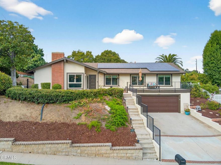 Price reduced 60k!! Rarely available in Camarillo's coveted La Entrada neighborhood, this 2,008 sq ft single-level 4BD/2BA hillside home sits on a 10,001 sq ft lot with privacy, treetop views, and a desirable south-facing orientation. Relax on the newly rebuilt front deck with mountain views and Camarillo breezes, just steps from Nancy Bush Park and a short stroll to Las Posas Plaza dining, shopping, and Starbucks. The thoughtfully updated ranch-style floor plan features a step-down living room with wood-beamed cathedral ceilings, a brick gas/wood-burning fireplace, and large windows that fill the home with natural light. Upgrades include a paid-for solar system, 2020 HVAC replacement, a newer higher-capacity electric water heater ideal for a large family, water softening system, stainless steel appliances, upgraded vinyl windows and sliding glass door, and all-new luxury vinyl plank flooring, carpeting, and baseboards. The exterior has been refreshed with paint, updated trim, block walls, railings, and landscaping with mulch, rock, and a fountain water feature. A two-car garage plus an oversized driveway provides off-street parking for up to six vehicles, while a versatile bonus space is perfect as a man cave, she shed, or artist studio. With proximity to Las Posas Country Club, this hidden-gem neighborhood is known for homes that rarely come on the market.