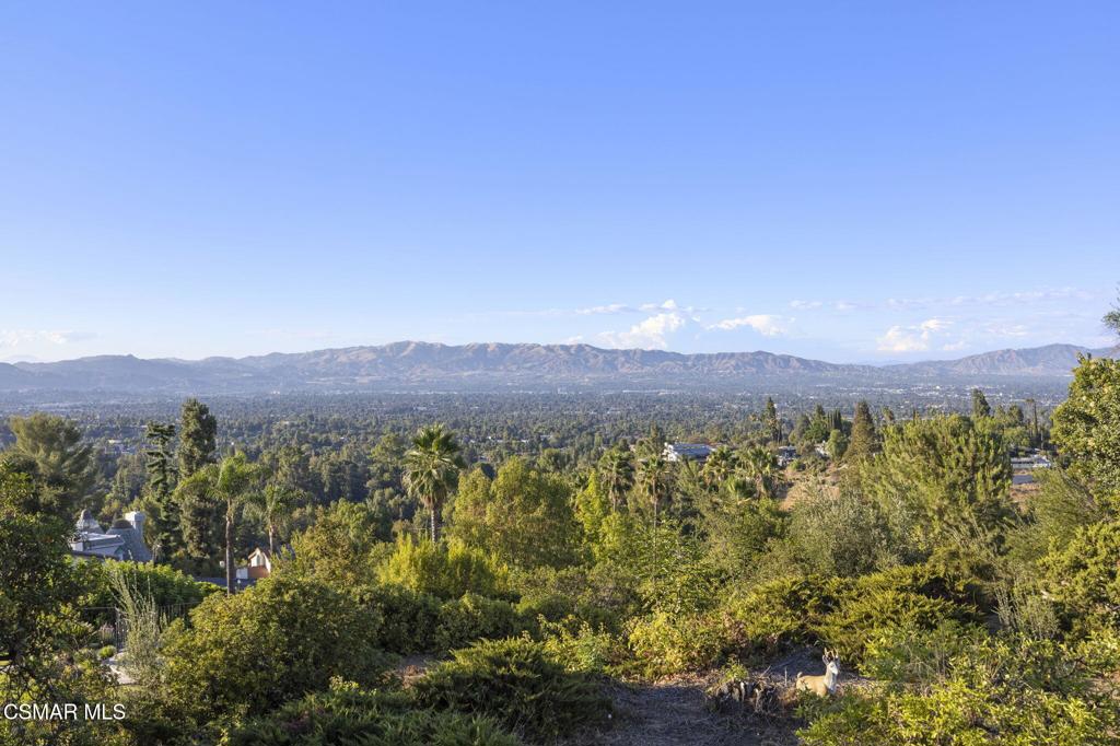 Views!! Unobstructed views of the valley!! Home is located up high in the hills south of the Blvd on a quiet cul-de-sac of only 7 homes. First time on the market in 58 years from the original owner/family. 4 bedrooms with 4 baths, 3-car garage with direct access. Inside laundry room with counter space and many cabinets. Large lot with unobstructed views from the kitchen, family room, main bedroom and from the entire rear yard. House has been re-piped with copper plumbing. Metal tile roof.