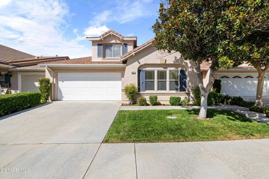 Welcome to the peaceful and private gated 55+ community of Casa Flores!This charming home offers 2 spacious bedrooms, 2.5 bathrooms, and a versatile loft-perfect for a home office, hobby space, or guest area. The open-concept main floor features custom woodwork throughout, adding warmth and character. The inviting living room includes a cozy fireplace and built-in cabinetry, while the adjacent kitchen is equipped with tile countertops, recessed lighting, a breakfast bar, a pantry with sliding drawers, and ample cabinet and counter space. The primary suite is conveniently located on the first floor and boasts a spacious walk-in closet, soaring ceilings, dual sinks, and a walk-in shower with a built-in bench. Also on the main level are a guest powder room and a dedicated indoor laundry room for added convenience.Upstairs, the second bedroom serves as a private retreat with closet doors and an en-suite bathroom featuring a shower-over-tub.Additional highlights include dual-pane windows, wood-like flooring, abundant natural light, and an attached two-car garage with direct access.Enjoy low-maintenance outdoor living with a wraparound patio and a lemon tree-perfect for relaxing or entertaining.Casa Flores offers resort-style amenities, including a community pool, spa, and scenic walking paths with benches. Ideally located near restaurants, markets, parks, the Metro station, and with easy freeway access, this home combines comfort, convenience, and community.