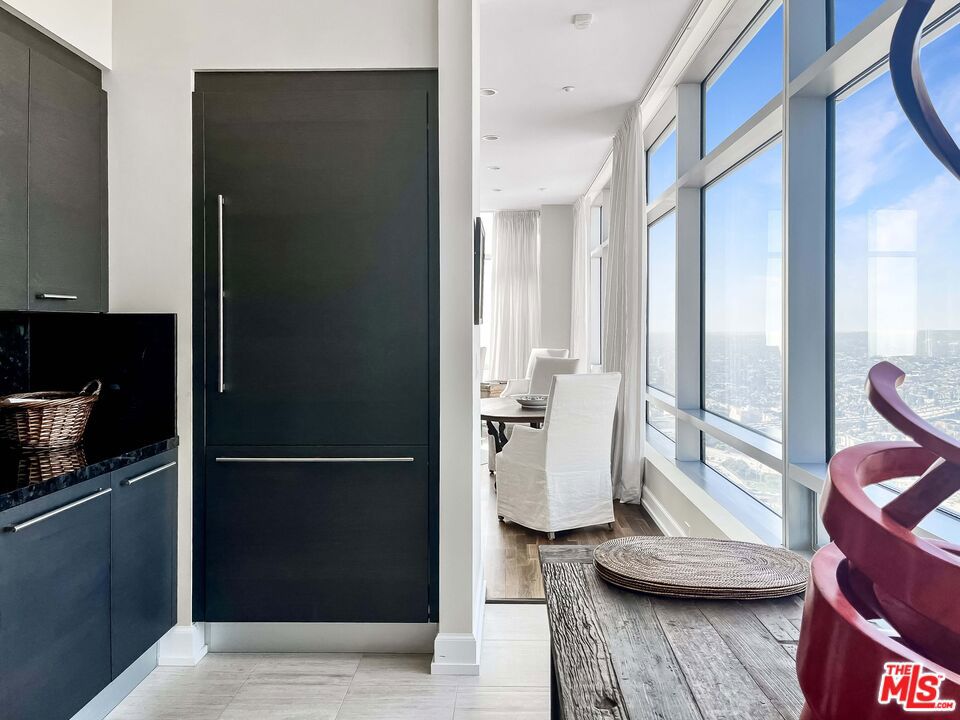 Stunning 44th Floor Unfurnished Rental at the Very Popular Ritz Carlton Residences Los Angeles. 5 Star High Rise Living in this Southwest Corner Condominium at near 2000 square feet. Large primary suite with 3 walk in closets, spa-like en suite bathroom and absolutely stunning western views. The living and dining areas also have the corner views to the south and west capturing the Pacific Ocean, Hollywood Sign and Observatory. Living area also has a den/office area. The powder room and 2nd bedroom are on the opposite side of the primary. 2nd bedroom has one large walk in closet and an en suite bathroom. The building is in a prime location with 24 hour security, valet parking, LA Live restaurants, concerts, games and more. Experience the white glove lifestyle the Ritz is known for. Excellent credit, references, application package are a must and renters insurance required. No smoking of any kind permitted. Building charges a $500 move in and out fee. First 7 interior photos are virtually staged including light fixtures. Make your appointment today.