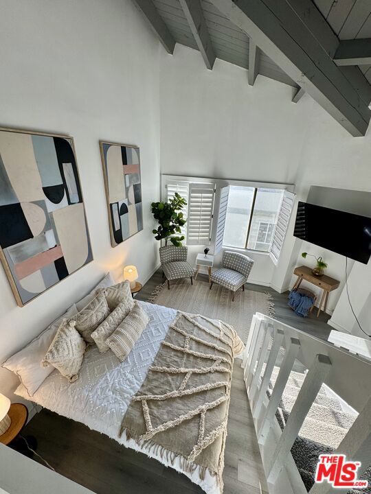 Located just steps from the beach, this charming multi-level 1 bedroom, 1 bath unit with a versatile loft/office space is the perfect coastal retreat. Enjoy serene lagoon views from your private balcony and relax by the cozy fireplace in the spacious living area. The unit features modern updates, ample natural light, and a well-appointed kitchen. Additional highlights include a one-car garage for convenience, and a prime location within walking distance to the sand, local cafes, and shops on the Marina Peninsula. Whether you're working from home in the loft or soaking in the beachside atmosphere, this property offers a unique blend of comfort and coastal living.