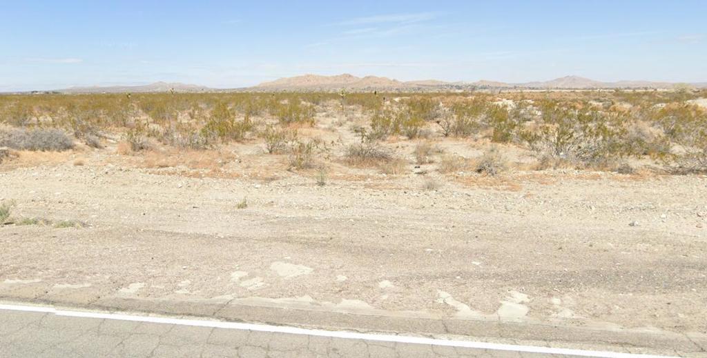 4.96 acres of investment land at a great price. Zoned A-2 Heavy Agricultural with Single family Residences with permitted uses of crops, greenhouses, raising of cattle, poultry, horses, sheep, goats, animal hospitals, dairies, dog kennels and livestock feed lots. This property is listed at a low $/acre (the key factor of land investment).