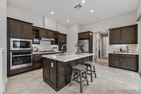 Photo of 16750 Coyote Bush Drive Dr #97, San Diego, CA 92127 (MLS # 260007585SD)