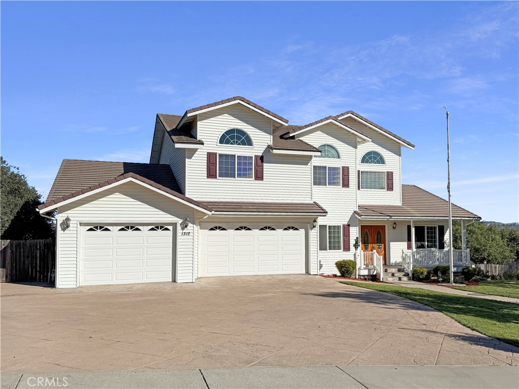 Welcome to 1312 Oak Ridge Way — a stunning 4-bedroom, 4.5-bathroom home offering nearly 3,500 square feet of beautifully designed living space in one of Paso Robles’ most sought-after neighborhoods. Situated on a generous 37,000+ square foot parcel with picturesque hillside views, this home blends timeless elegance with everyday comfort.
Step inside to find a freshly updated interior featuring new paint throughout, luxury vinyl flooring, and new carpet in key areas, creating a warm and inviting atmosphere. The thoughtfully designed layout includes multiple living areas, a formal dining room, and a chef’s kitchen with granite countertops, ample cabinetry, and a center island perfect for entertaining. Each of the four bedrooms is generously sized and includes its own en-suite bathroom, offering privacy and convenience for family and guests alike. The expansive primary suite includes a luxurious bath with dual vanities, a soaking tub, walk-in shower, and large walk-in closet.
Enjoy seamless indoor-outdoor living with access to a spacious backyard oasis — ideal for relaxing, gardening, playing, or hosting gatherings under the stars. The outdoor space includes a built-in grill and deck area perfect for al fresco dining, with potential to build an ADU for additional living space or rental income.
Additional highlights include a spacious laundry room, guest powder room, an attached 3-car garage, central vacuum system, tankless water heater, whole-house water filter, and softener — all contributing to the home's comfort and efficiency.
Ideally located near downtown Paso Robles, award-winning wineries, and top-rated schools, this move-in-ready home offers the perfect blend of wine country charm and modern living.