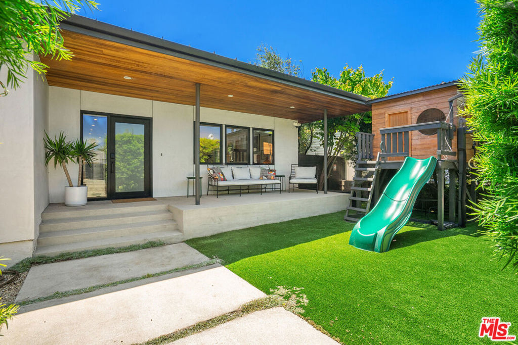 Welcome to your own slice of California paradise! This light-filled, beautifully maintained home is the ultimate beachside retreat, offering the best of indoor-outdoor living with stunning Fleetwood doors that let the sunshine in and invite the ocean breeze through. Downstairs, you'll find soaring ceilings in the airy living room, a chef's dream kitchen complete with a walk-in pantry, sleek stainless steel appliances, a pot filler (hello, pasta night!), and a cozy dining area perfect for casual brunches or intimate dinners. Two spacious bedrooms and a stylish full bath round out the main floor, plus a super practical laundry/mudroom. Throughout the home, luxe design details like wide-plank hardwood floors, Carrara marble countertops, custom walnut cabinetry, and Hansgrohe fixtures elevate every inch. Upstairs, the dreamy primary suite is your private retreatfeaturing a spa-like bathroom with double sinks, a huge walk-in closet, custom built-ins, a private balcony with a Malm fireplace, plus an outdoor sauna and shower for the full resort experience. An additional bedroom and 3/4 bath are also upstairs - great for guests or an office. Step outside into your tropical backyard oasis, where you can chill by the pool and hot tub, roast s'mores around the fire pit, or entertain friends under the stars. The front yard even features a designer playhouse with a slide, swings, and a climbing dome (easily removable if playtime isn't your vibe). Just minutes from Whole Foods, Penmar Golf Course, and all the Venice faves. Grab a morning latte at Menotti's, Bluestone Lane, or Great White, cruise to Gjusta or The Butcher's Daughter for lunch, and enjoy nights out at Felix Trattoria, Dudley Market, or De Buena Planta. You're also close to the beach and Abbot Kinney's iconic shops and galleries. Pets considered. Pool maintenance and landscaping are covered by the Owners. Available for move-in mid-August. Don't miss out on this perfect blend of laid-back luxury and SoCal sunshine!