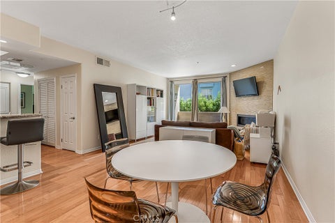 Photo of 16940 Chatsworth Street #211, Granada Hills, CA 91344 (MLS # SR26190298)