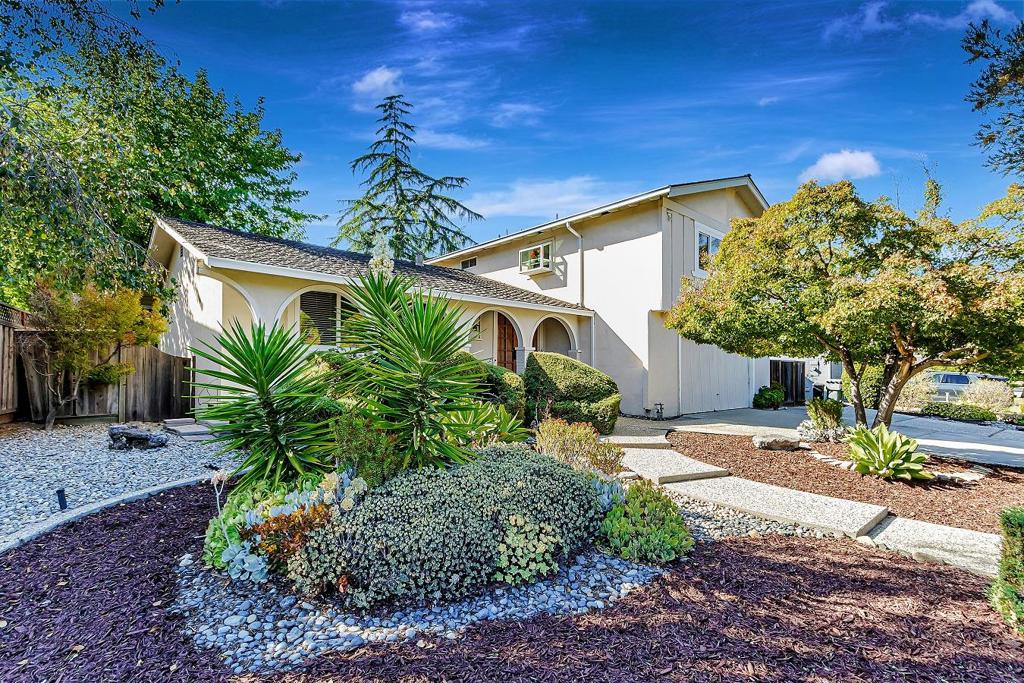 Step into this Almaden Valley home in the sought-after Shadow Brook neighborhood with 4 bedrooms, 2.5 baths, where over 2,200 square feet of living space, combines comfort and style. From the wide-plank luxury vinyl flooring to the vaulted ceilings and sun-filled windows, every detail has been thoughtfully designed. The bright kitchen with quartz counters and stainless-steel appliances flows seamlessly to the family room, where a cozy fireplace and sliding doors invite you out to the private backyard retreat. Surrounded by lush landscaping, mature trees, and inviting patios, this home offers both elegance and everyday functionalityall just moments from top-rated schools, scenic trails, and the exclusive Shadow Brook Swim Club. Graystone, Bret Harte and Leland Schools.