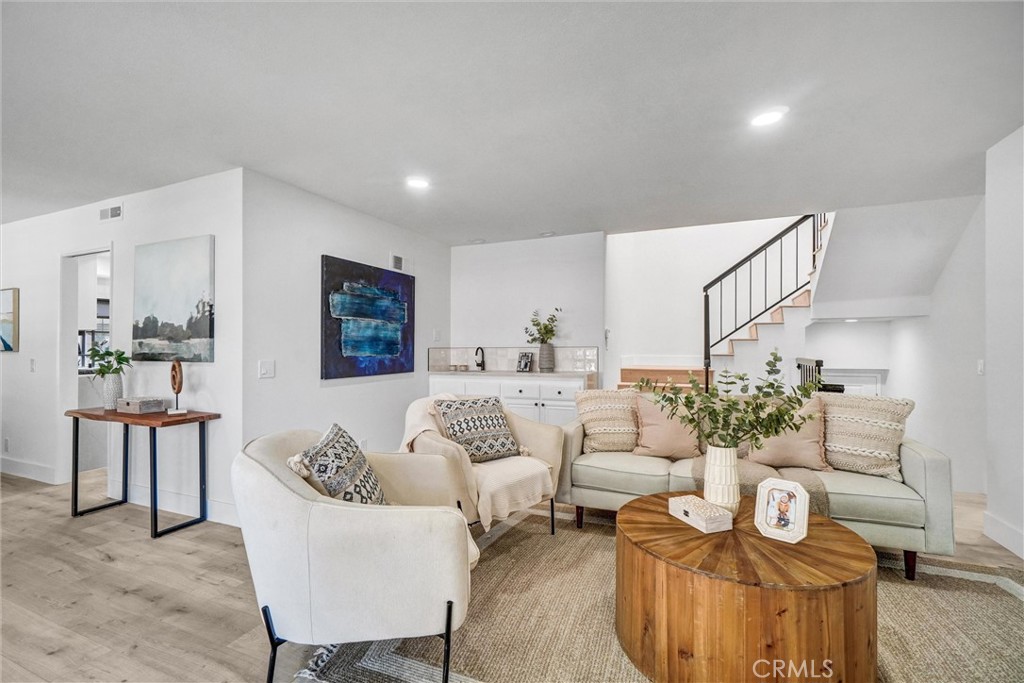 Spacious Renovated 3-Bedroom Condo in Prime Garden Grove Location!
Welcome to this beautifully renovated 3-bedroom, 3-bathroom condo offering over 1,700 sq ft of comfortable living space in a quiet and well-maintained community. This move-in ready home features a desirable open layout, with one bedroom and a full bathroom conveniently located on the main floor—ideal for guests or multi-generational living.
Enjoy a completely updated interior with new vinyl flooring throughout, new light fixtures, recessed lighting, mirror closet doors, and a stylish wet bar in the living area—perfect for entertaining. The large kitchen has been upgraded with brand new stainless steel appliances, quartz countertops, and a separate dining area for added functionality.
Additional highlights include a new bathroom vanity in all baths, newer central AC, and an attached 2-car garage for direct access and extra storage.
This well-kept community offers fantastic amenities, including a pool, hot tub/spa, playground, and plenty of guest parking. Ideally located near SteelCraft, Garden Grove Main Street, South Coast Plaza, restaurants, shopping, and easy freeway access for commuting.
Don’t miss this rare opportunity to own a spacious, upgraded condo in one of Garden Grove’s most convenient neighborhoods!