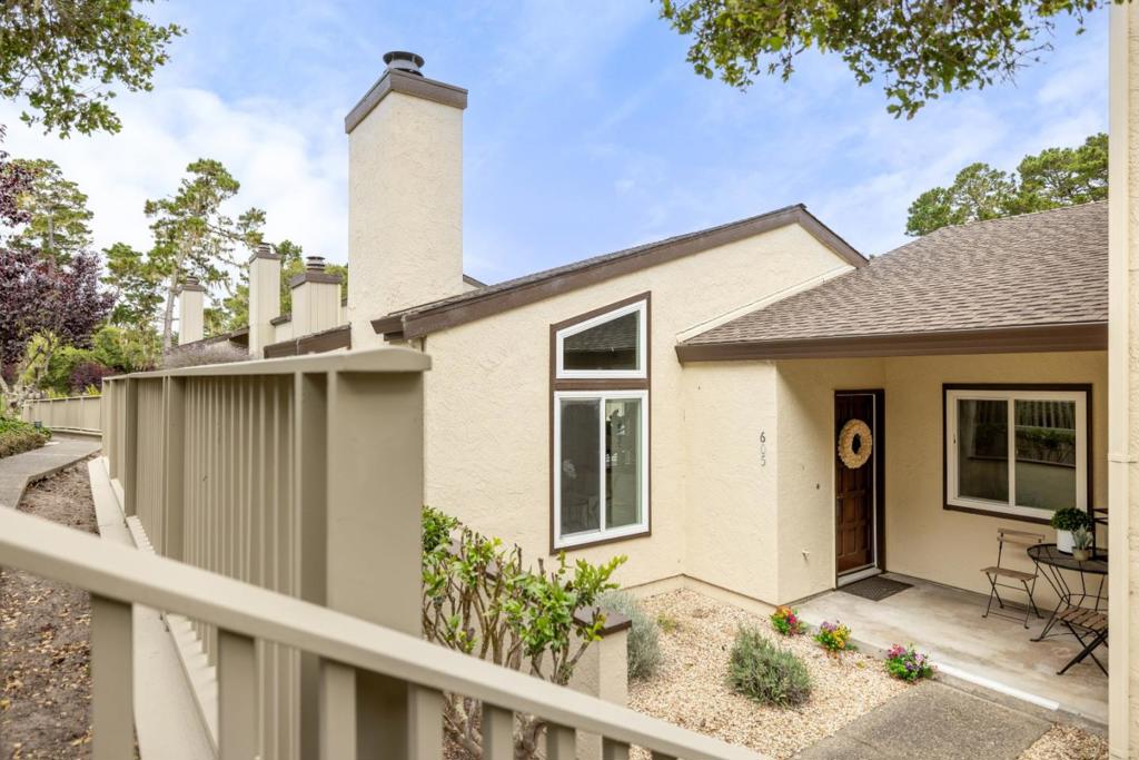 Charming, Updated, and Ideally Located in Pacific Grove. We invite you to come feel the comfort and charm of 605 Sage Court a beautifully 2-bedroom, 2-bathroom split-level condo nestled in the sought-after Forest Grove community. This thoughtfully updated home features a stylish kitchen with quartz countertops, custom cabinetry, and high-end appliances that make every meal a joy to prepare. Rich hardwood floors and new dual-pane windows add both beauty and energy efficiency throughout. Start your mornings with coffee on your private patio surrounded by fruit trees, or indulge your green thumb in the garden planting space of the patio. With a detached two-car garage and a location just moments from the Country Club Gate Shopping Center, Asilomar Beach, and downtown Pacific Grove, convenience meets lifestyle at every turn. Whether you're seeking a weekend retreat or your forever home, 605 Sage Court is a must-see. Come discover the charm and comfort for yourself!