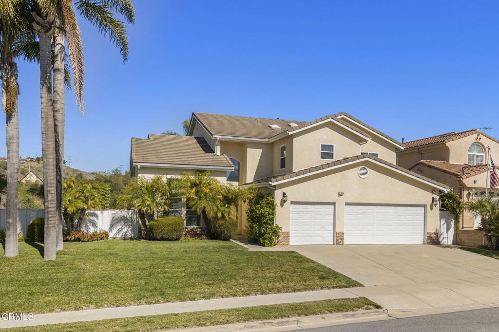 Welcome to 7429 Nixon Court on a serene cul-de-sac in Ventura's highly desirable Presidential Tract. With fragrant citrus trees and ocean breezes, this gorgeous rental property features over 3,200 square feet of living space with wood-like flooring and a layout designed for everyday living and entertaining. The first floor includes multiple living areas: a formal dining room, a breakfast nook, living room, and a spacious family room with fireplace. A downstairs bedroom with a built-in desk and nearby full bath is perfect for guests, a home office, or flexible living needs. The kitchen comes fully equipped with brand new stainless steel appliances, including a refrigerator, stove, oven, warming drawer, and dishwasher. A new full-size washer and dryer are also included in the rental. Upstairs, the large primary suite frames hillside views and includes a walk-in closet, soaking tub, dual vanities, and a separate shower. Two additional bedrooms, a full bathroom, and a generous loft offer plenty of space for everyone. The backyard is designed for relaxation and gatherings, featuring a built-in BBQ, grassy turf area, and side yard with a fire pit. A 3-car garage offers plenty of storage and parking. Close to parks, shopping, dining, the beach, hospitals, and schools--this is a great place to call home. Landscaping maintenance included. Tenant pays utilities.