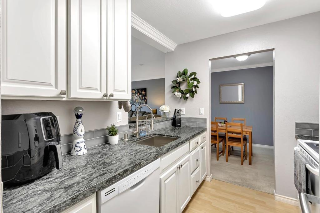 Welcome to this spacious and upgraded 3-bedroom condo located in the sought-after Murieta complex, a gated community in the heart of Newark's most desirable area. This corner unit is the largest floor plan available and boasts an attractive price, making it a great value for those looking for a new home. This freshly painted unit offers a large master bedroom featuring an ensuite bathroom with double sinks, and a newly renovated kitchen featuring updated granite countertops, backsplash, and recently painted cabinets. The unit also comes with two assigned parking spaces, one covered and one uncovered, and access to the complex's gym and pool. What sets this unit apart is the rare balcony view of the interior courtyard, providing a peaceful and serene environment. Enjoy the peace of mind that comes with living in a gated community, with all the amenities and security that it provides. Don't miss out on this fantastic opportunity at an attractive price! Please visit www.39887cedar.com