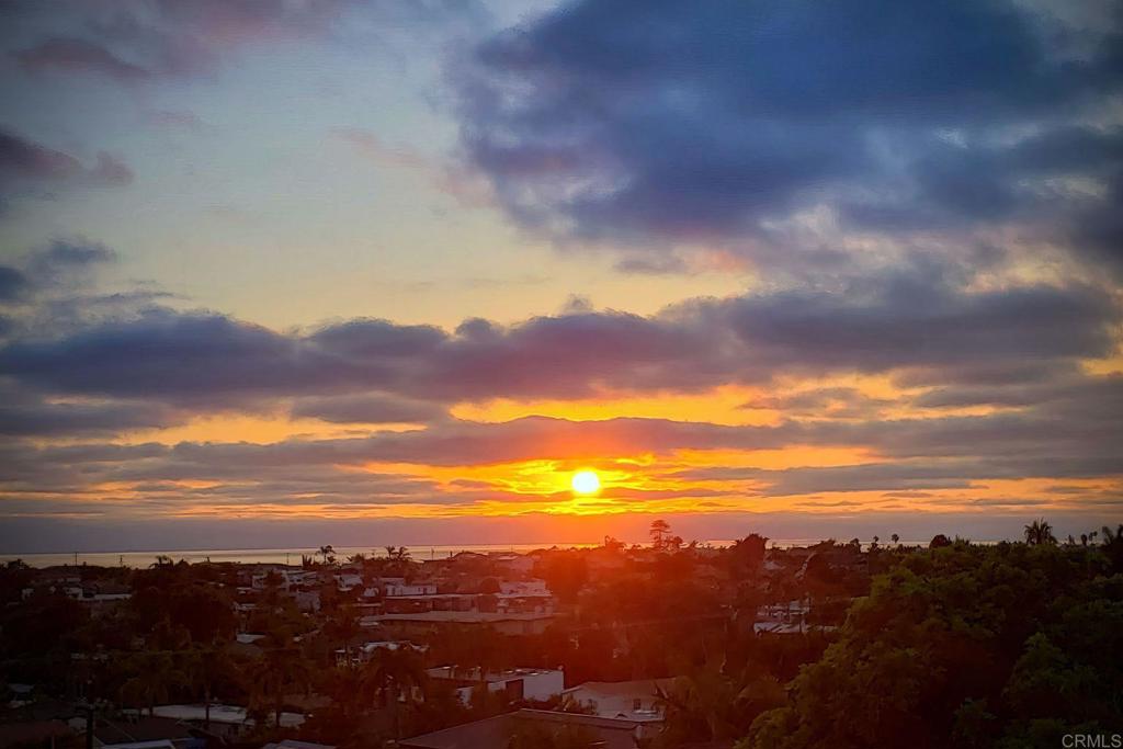 Wow - 5% price improvement! Living West of the 5 with epic ocean views is what we all dream about when living in San Diego! Biking to the beach, toes in the sand, sunset strolls, grabbing the surfboard ~ all exist moments from this amazing home & community! 180-degree ocean views. Daily sunsets. It is said that “location is everything” - this house & lot define that! When stated – “the view is worth a million dollars” this location is the epitome of that phrase. West of the 5 in idyllic Encinitas- 289 Hygeia Ct purely captures “opportunity meets ideal location”. Unparalleled views greet you from the kitchen, dining room and living room in addition to Primary BR, lower level “extra room” & backyard. Magnificent pie shaped lot tucked away at the end of a Cul de sac – the backyard faces completely due West offering three distinctly separate spaces for potentially different uses! Room for a pool? Indeed! Awesome “al dente” dining and entertaining possibilities await you. Sip on your favorite adult beverages with friends watching the sun dip below the horizon from countless locations. Fabulous options for the dreamer who has always wanted to live in Leucadia, walk to beaches, restaurants, coffee shops AND create their “forever dream home”. Your Future Home: Awesome floorplan for coastal living! Split level with soaring 27' ceilings on upper level! Amazing light streams through a plethora of windows inviting the outdoors & breathtaking views in! Upper level offers expansive ocean views from the K, DR, LR & balcony w/ two spacious bedrooms & one full bath. Lower level: Primary bedroom w/ ocean view, ensuite bath and walk-in closet. A "bonus" room adjacent to Primary has endless possibilities: yoga room, office, game room, meditation studio - let your imagination do with it what you will. Access to the outside area from this room through sliding glass doors. Options galore on your 7,350 sf pie shaped lot: a small pool, a fabulous outdoor dining area, options for fabulous gardening - three distinctly different areas for your imagination to soar. While it might be tempting to nestle away in your private ocean view home and yard ~ Encinitas living has endless options to explore: countless restaurants, sandy beaches, unique shopping, mediation gardens & more. This home is your opportunity to customize a home 100% to your liking~