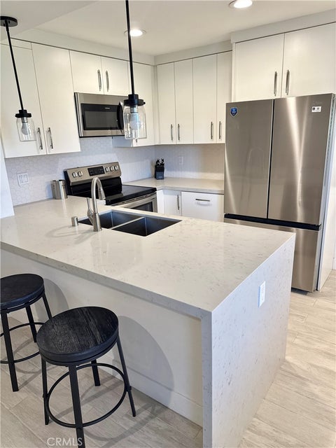 Photo of 78403 Terra Cotta Court, La Quinta, CA 92253 (MLS # CV26190355)