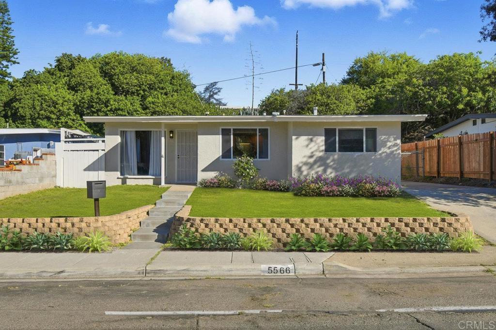 Welcome to this charming and versatile 4-bedroom home in the heart of San Diego! Freshly updated with contemporary interior and exterior paint, this home boasts a modern and inviting look throughout. One of the bedrooms offers flexible use as a family room, home office, playroom, or shared space. The spacious kitchen serves as the heart of the home, featuring generous counter space, ample cabinetry, and included appliances—perfect for both daily living and entertaining. Each bedroom offers oversized closets and abundant natural light, while the inside laundry room provides built-in cabinets, tons of storage and a convenient work area. Outside, the large backyard includes a dedicated dog run area and plenty of room for parking, play, or potential expansion. A long pull-up driveway ensures ample parking for multiple vehicles. Centrally located with easy access to major freeways, public transportation, and shopping, this home blends comfort, convenience, and opportunity—all in one!