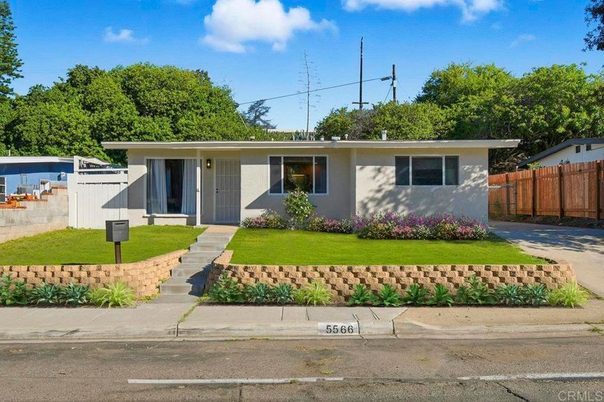 Welcome to this charming and versatile 4-bedroom home in the heart of San Diego! Freshly updated with contemporary interior and exterior paint, this home boasts a modern and inviting look throughout. One of the bedrooms offers flexible use as a family room, home office, playroom, or shared space. The spacious kitchen serves as the heart of the home, featuring generous counter space, ample cabinetry, and included appliances—perfect for both daily living and entertaining. Each bedroom offers oversized closets and abundant natural light, while the inside laundry room provides built-in cabinets, tons of storage and a convenient work area. Outside, the large backyard includes a dedicated dog run area and plenty of room for parking, play, or potential expansion. A long pull-up driveway ensures ample parking for multiple vehicles. Centrally located with easy access to major freeways, public transportation, and shopping, this home blends comfort, convenience, and opportunity—all in one!