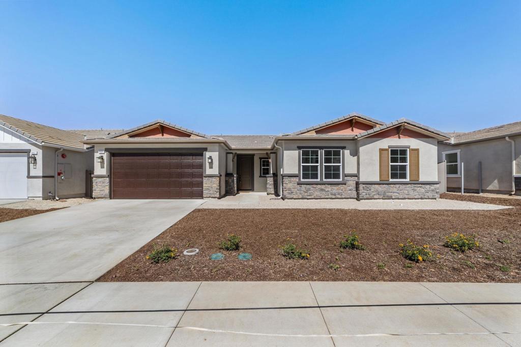 Welcome to your Brand New sanctuary in Escondido's vibrant East Grove neighborhood! This sparkling single-story gem by KB Homes is a 3 bed/2.5 bath haven with the option for a 4th bedroom/office/den with a Paid-For 3.24kw solar system. ** This may be the Best priced New construction SFR in Escondido ** The open floor plan is perfect for hosting family gatherings or just unwinding in your own oasis. And those fire-hardening features? As a result, you can get very competitive Homeowner Insurance! "This home at Dixon Trail is the nation's 1st community to meet the IBHS's new neighborhood-level wildfire resilience standard: Wildfire Prepared Neighborhood. The community will serve as a model for research-backed methods to reduce wildfire risk and underscore KB Home's dedication to building innovative homes and communities that offer greater peace of mind."