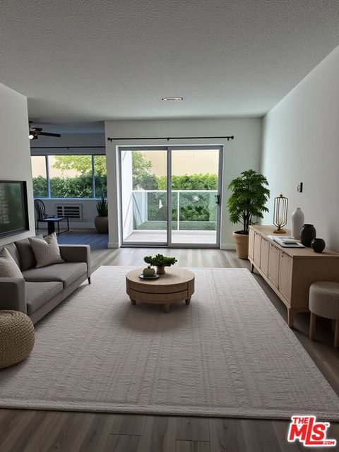 Photo of 425 S Willaman Drive #110, Los Angeles, CA 90048 (MLS # 26647879)