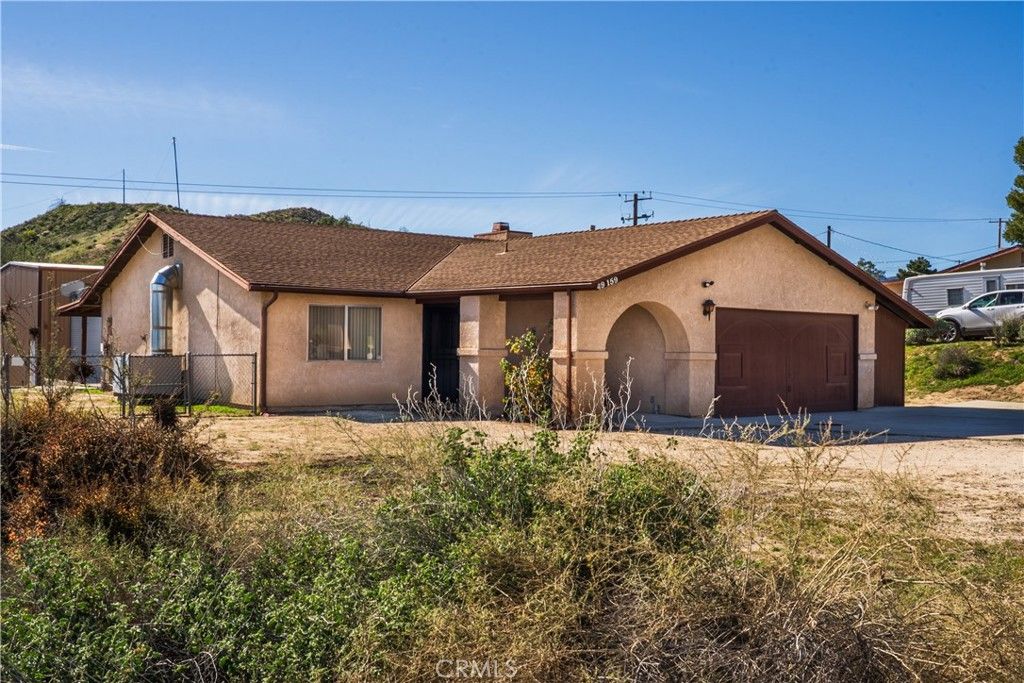 Photo of 49159 Tamarisk Dr, Morongo Valley, CA 92256 (MLS # JT26011274)