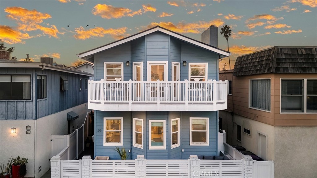 Nestled in a coveted beachside enclave, this exquisite two-story luxury home offers the ultimate coastal living experience. With views of both the sparkling ocean and serene bay, this property seamlessly blends sophisticated design with the relaxed, carefree lifestyle of the beach. Step inside to an open-concept living space flooded with natural light, showcasing soaring ceilings and expansive windows that frame breathtaking beach lifestyle. The chef-inspired kitchen is a dream, featuring amazing appliances, sleek custom cabinetry, and a spacious island that invites both culinary creativity and casual entertaining. Whether you're preparing a gourmet meal or enjoying a casual breakfast with ocean breezes, the kitchen is perfectly positioned to capture the beauty of your surroundings. The coffee bar is a must have in any home. The main floor flows effortlessly into the living and dining areas, creating a seamless space for hosting family and friends. Large glass doors lead out to a private terrace, where you can unwind while taking in the sounds of the surf and the tranquil view of the bay. An ideal spot for al fresco dining, sunset cocktails, or simply relaxing in the sun. The master suite is a serene sanctuary, A spa-like ensuite bath ocean views, complete with a in deck spa, provides the perfect retreat after a day on the beach. Additional bedrooms are spacious and thoughtfully designed, offering ample space for guests or family. As well as an amazing office This home is designed for those who appreciate the finest things in life – whether you’re lounging on one of 4 outdoor areas, enjoying a day at the beach, or entertaining in style, this property epitomizes the relaxed luxury of beachfront living. With easy access to the sand and all the amenities of the coastal lifestyle, this is more than just a home; it’s a place to truly live the dream.