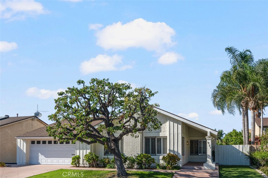 Welcome to 924 Jasmine Circle in Costa Mesa's Greenbrook neighborhood. Situated at the end of a quiet culdesac, this single level, 3 bedroom, 2 bath home expands nearly 2,000 ft. Upon entering, you’re welcomed into the large living area with soaring vaulted ceilings and a fireplace. Pass through the dining area into the open kitchen at the rear of the home which is connected to the second living area and has been expanded to add an additional nearly 200 sqft of living space. Rear living area features sliders that look onto the private back yard. 2 generously sized bedrooms share the hall bathroom that has been updated. Primary bedroom is spacious and features a slider with direct access to back yard area. Spacious and newly remodeled primary bath with large closet area. This home features an interior laundry area/mudroom off of the garage entry. Highly desirable floor plan and location in a neighborhood that features no power lines and incredible access to shopping, dining, and freeway access to anywhere you want to go. Priced to sell, this home will be gone in no time, come and see before it’s too late!