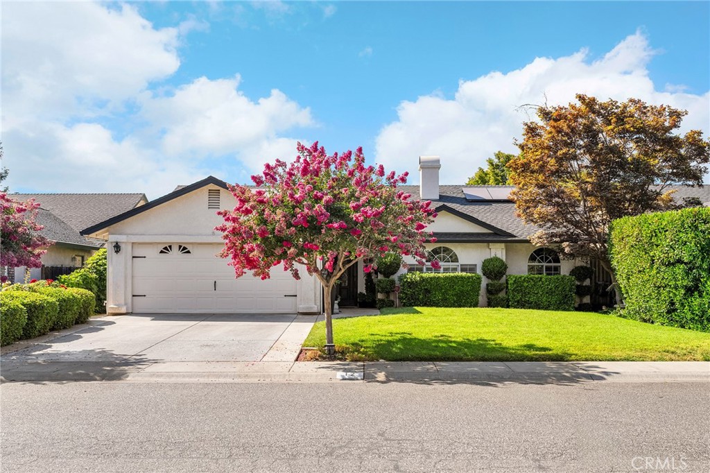 Price Improvement..!! Well cared for 3 bedroom 2 bathroom "Avenues" home near Enloe Hospital and CSU Chico. Not only does this property have incredible curb appeal, it backs up to an orchard providing additional privacy to a beautifully landscaped yard. Interior features include vaulted ceilings, skylights, ceiling fans, whole house fan and gas fireplace. Separate living room, family room, dining room and breakfast nook. The kitchen is equipped with granite counters, stainless steel appliances and an island with raised countertops. The primary suite includes a soaking tub, access to the back yard and walk in closet. Indoor laundry. Dual pane windows. PLUS...this home comes with a prepaid solar energy power purchase agreement!