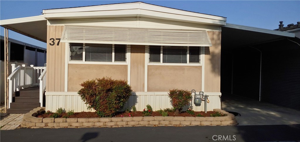 THE ULTIMATE, AFFORDABLE, RETIREMENT DOWNSIZE. Invest the equity in your home in this opportunity to retire in Southern California for only $225 a month association dues and live RENT FREE! This 2/BR 2 bath mobile home is in pristine like new condition with all new floors, carpet and paint. It has a great open floor plan and a large living area. There are 2 storage sheds outside too. Be one of 38 Members to own this picturesque senior mobile home park. Association dues pay for real-property taxes, park maintenance and spectrum cable. Spectrum cable includes 2 HD receivers with over 200 channels and internet with WiFi. This is a 39 space (yes, you would also own a share of one rental space and the common area) senior park. This mobile home park has no landlord other than the Members (you and the other resident owners). No worry about your landlord arbitrarily raising your rent or selling the park. You will be one of the owners! This purchase price includes your membership (share) in this Mobilehome Owners Association that owns over 3.6 acres of real-property. Enjoy the central park recreation area located adjacent to the front of this home and play horseshoes or picnic. The pride of ownership is throughout this well kept park. These memberships have been selling quickly!