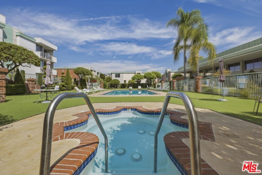 Photo of 5301 Balboa Boulevard #F8, Encino, CA 91316 (MLS # 26668625)