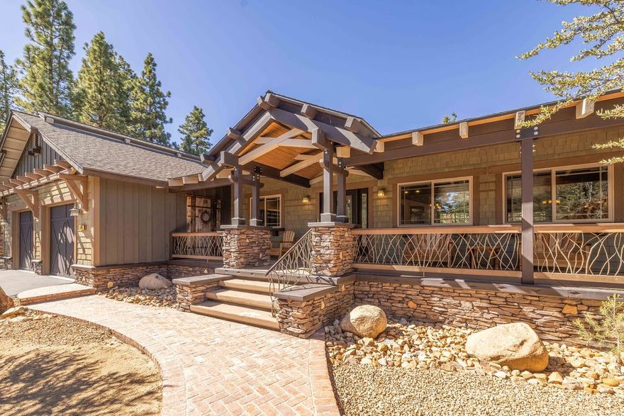 This breathtaking custom Craftsman home is tucked away on a quiet cul-de-sac in highly sought-after Meadowbrook Estates, offering privacy, serenity & timeless mountain charm. Built in 2014, this home showcases exceptional craftsmanship throughout — from the warm wood ceilings and detailed wood paneling to the open-concept layout that perfectly blends rustic elegance with modern comfort. The gourmet kitchen is a chef’s delight, featuring custom counters, a 6-burner range, spacious pantry, with high-end finishes throughout. The living area is centered around a stunning stone fireplace, perfect for cozy gatherings, while large windows frame the natural beauty that surrounds the home. With four spacious bedrooms, including two massive primary suites, each offering walk-in closets and luxurious private bathrooms, this home is ideal for multi-generational living or hosting guests. Step outside to enjoy the peaceful natural landscaping, thoughtfully designed for beauty and low maintenance. Recognized as the 2018 selectee for the Big Bear Valley Xeriscape Water Wise Garden Tour, this property harmonizes perfectly with its mountain setting. Close to the National Forest & only minutes from Big Bear Lake, ski slopes & the Village, this extraordinary home offers the best of mountain living - privacy, elegance, and connection to nature — all in one exceptional package. This is the mountain dream home you’ve been waiting for.