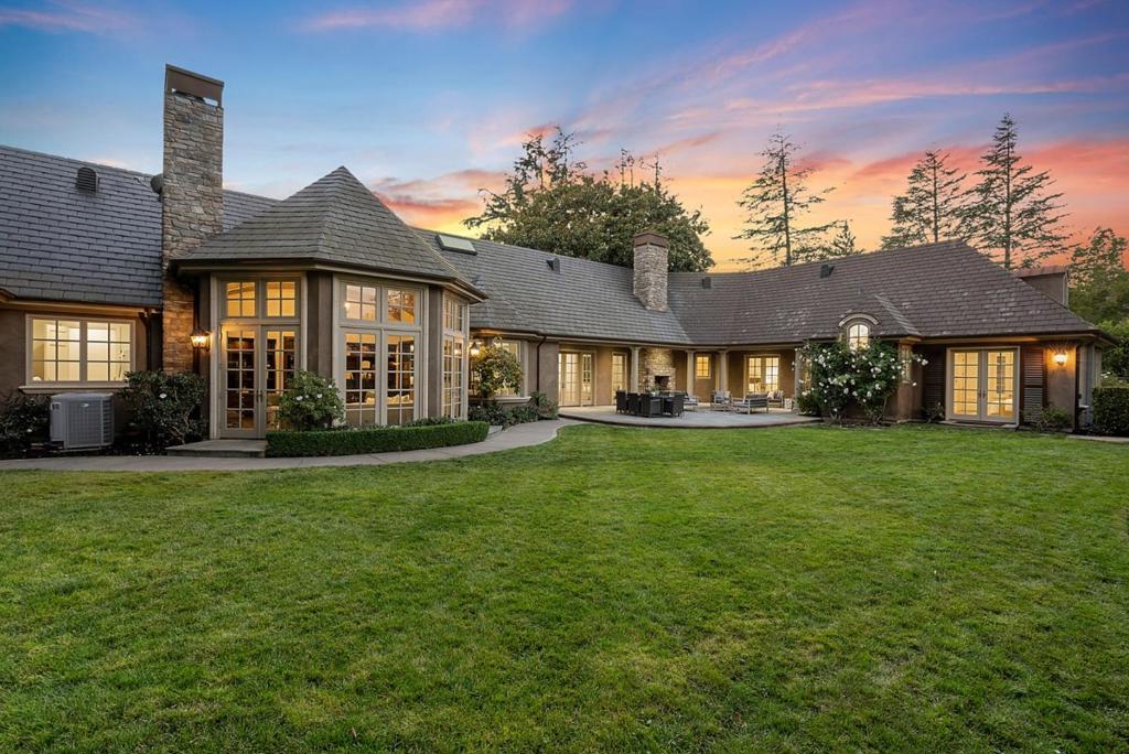 Nestled in exclusive Lindenwood, this enchanting Pacific Peninsula Group masterpiece boasts luxury & exquisite details throughout. Set on nearly an acre of impeccably landscaped flat grounds, this timeless property offers the ultimate in indoor/outdoor Atherton living. Sprawling single-level floor plan w/soaring ceilings & stunning beams showcasing the magnificent living room, elegant formal dining room w/views of grounds & unforgettable great room w/floor-to-ceiling windows & fireplace. Gourmet kitchen w/bay windows, limestone countertops, luxurious island & large pantry. Primary bedroom retreat w/custom walk-in closet, spa-like marble bath & two addtl spacious bedrooms w/ french doors. Dedicated wine room. Exceptional guest house w/ kitchen, office & bedroom perfect for guests. Magical stone terrace & majestic grounds w/rose garden. Sought-after setting near downtown MP, PA, Caltrain & excellent schools. Truly one-of-a kind, do not miss this exceptional property in prime Lindenwood!