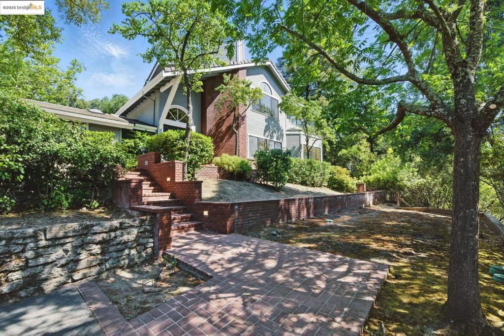 Unlock the full potential of this expansive property in one of Lafayette’s most sought-after neighborhoods. Nestled on a generous lot, this 3-bedroom, 3-bath home offers over 3,800 sq ft of living space, ready to be reimagined to your taste. Each living space provides ample natural light while the yard feels connected to nature with space to garden, gather and unwind. Whether you’re a seasoned investor, builder, or homeowner looking to customize your dream home, this is the perfect canvas! The flexible floor plan includes multiple living areas, a beautiful, well positioned kitchen space with outdoor access. Other access points provide room for a home office, guest suite and an indoor gym space. The primary suite boasts a dedicated upper level floor, along gorgeous sweeping views. The private, tree-lined backyard offers endless possibilities for outdoor living, entertaining, possibly a pool addition or ADU. Enjoy over a half acre of the charm of an established residential road while being just minutes from top-rated Lafayette schools, downtown shops, restaurants, and BART. This is a rare chance to create something truly special in a premium location. Bring your vision and tools—opportunities like this don’t last long.