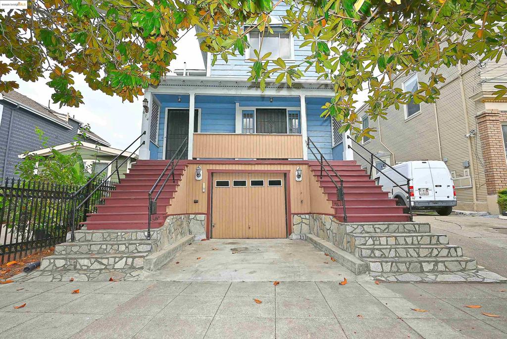 Nestled on a Magnolia tree–lined street in Oakland’s Hoover-Foster neighborhood, this charming 1904 duplex has been lovingly owned by the same family since 1969. The lower unit features a spacious living room with fireplace insert, a formal dining room with built-in china cabinet, and large windows that flood the space with natural light. The kitchen sits at the heart of the home, ready for a modern reimagination. Two bedrooms with walk-in closets are separated by a tandem bathroom. Upstairs offers a light-filled living room with built-in bookcases, heater insert fireplace, and peek-a-boo views of San Francisco and Downtown Oakland. The cozy eat-in kitchen and large bedroom with mirrored closet doors add vintage character. An underground tandem 2-car garage includes a basement with toilet, sink, and laundry area. The 3,200 sq ft lot offers expansion or ADU potential. Trust sale, sold as-is—an opportunity to restore and reimagine a piece of Oakland’s history. Centrally located with easy access to BART and major Bay Area commute routes, highways, eateries, cafés, and entertainment. Ideal for contractors, investors, or owner-occupied buyers seeking added income potential.