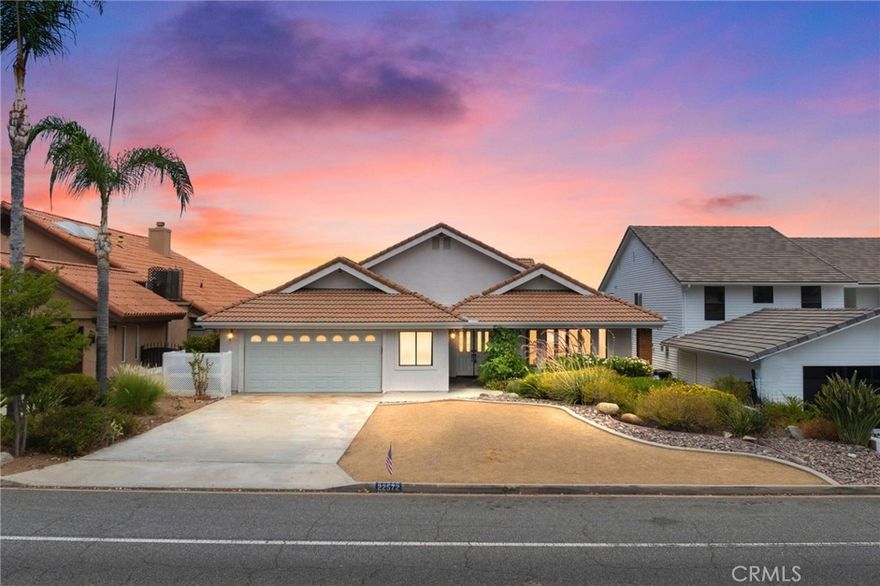 STUNNING WATERFRONT VIEWS! Second chances happen for a reason, right! Don’t miss your opportunity to own this remarkable single-story waterfront home featuring 3 bedrooms, 2 bathrooms, and over 3079 sq ft of living space. Perfectly positioned on the East Bay channel, this property captures some of the most breathtaking sunrises and sunsets Canyon Lake has to offer. GOT KIDS? NEED A WORK ROOM? WANT RENTAL INCOME? This property features an approximate 300 sq ft separate space that is ready to be whatever you need it to be. Back to the main house… you’ll find an open floor plan showcasing vaulted beam ceilings, formal living and dining areas, and a sunken bar, ideal for entertaining. The spacious kitchen provides ample counter and cabinet space, an extra large walk-in pantry, and direct access to the dining and living areas. Live in the home as it is or remodel and make it spectacular! The home includes an indoor laundry room, a two-car garage, and a flat driveway With its excellent bones and endless potential, this home offers an incredible opportunity to create your dream lakefront retreat. Two expansive decks and a long pathway leading to your private dock make this the ultimate waterfront. Canyon Lake is a 24 hour guard gated community with a private 525 acre lake, premiere wakeboarding and waterskiing, 18 hole SCGA rated golf course, Lakefront pool and clubhouse, Lakeside RV park, Equestrian center, tennis, basketball & pickleball courts, baseball fields, 4 beaches, 9 parks, a bicycle pump track, Senior Center, over 40 clubs to join and so much more!